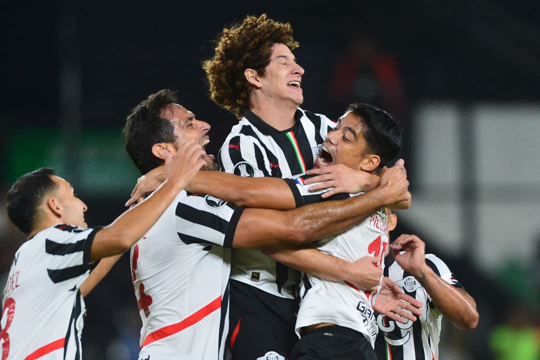 Ivan Franco comemora o gol em Libertad x Talleres. (foto: DANIEL DUARTE / AFP)