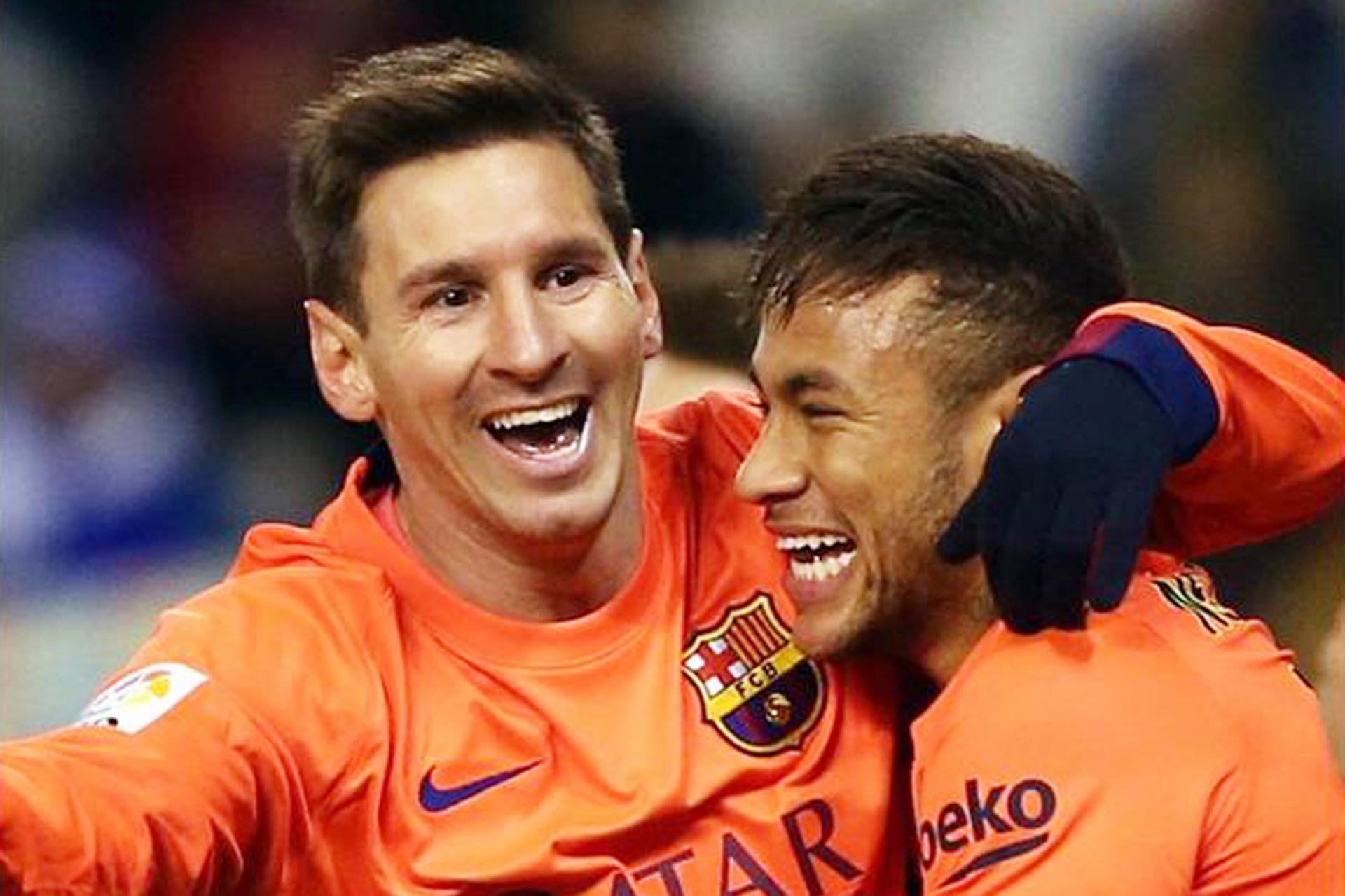 Messi e Neymar (Foto: Reprodução/Site oficial)