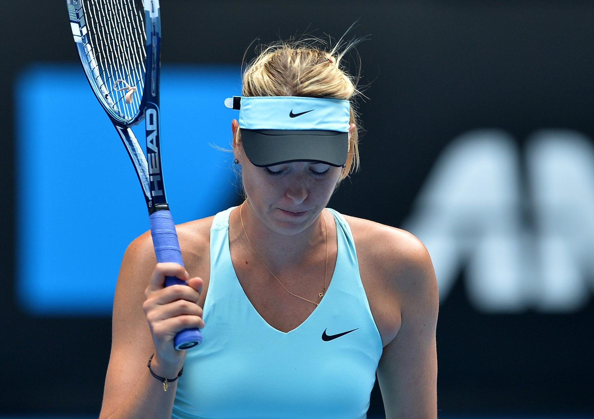 Maria Sharapova durante jogo contra Cibulkova (Foto: Paul Crock/AFP)