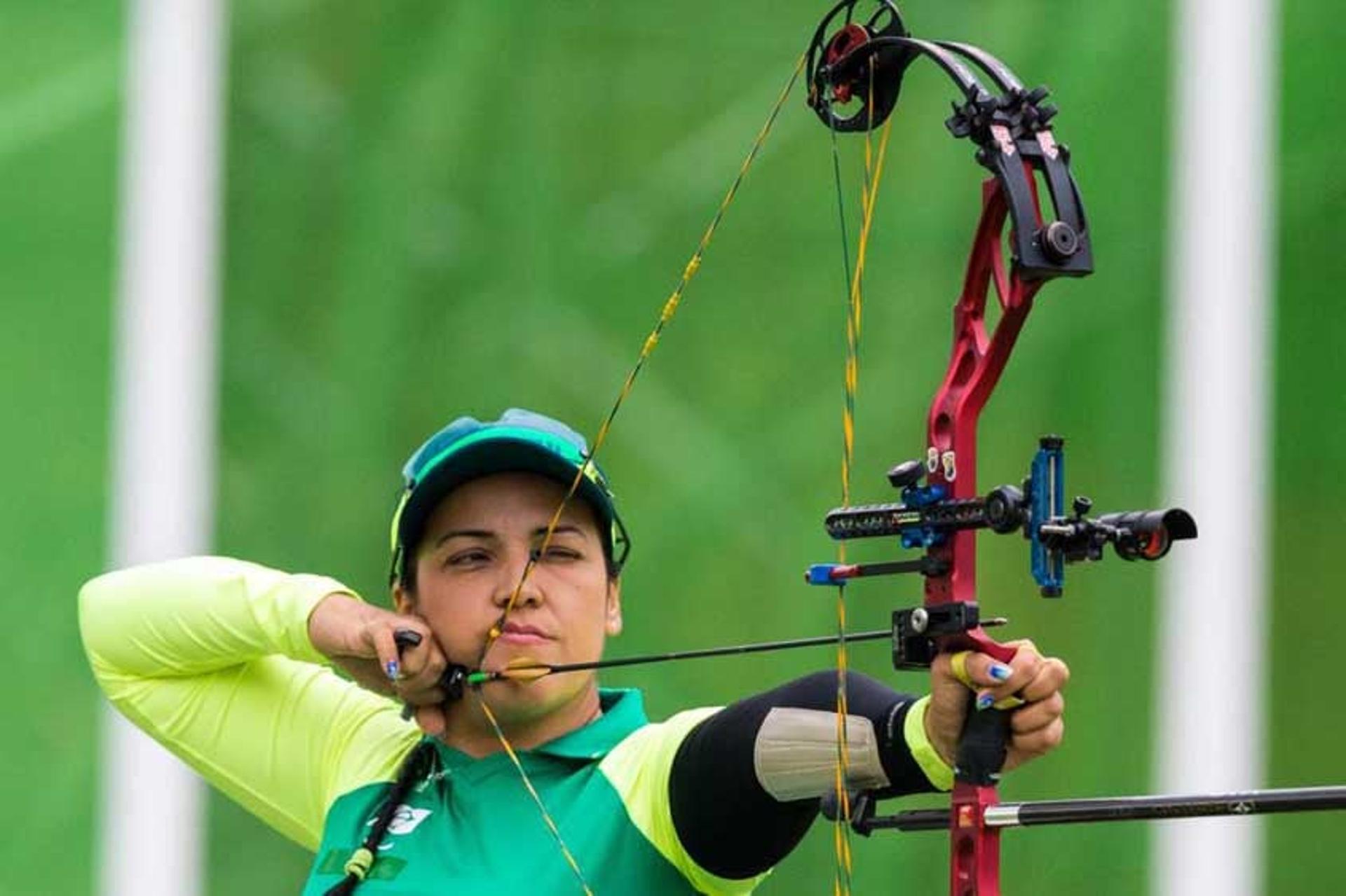 Antes de começar no tiro com arco, Jane era atleta do tênis de mesa.