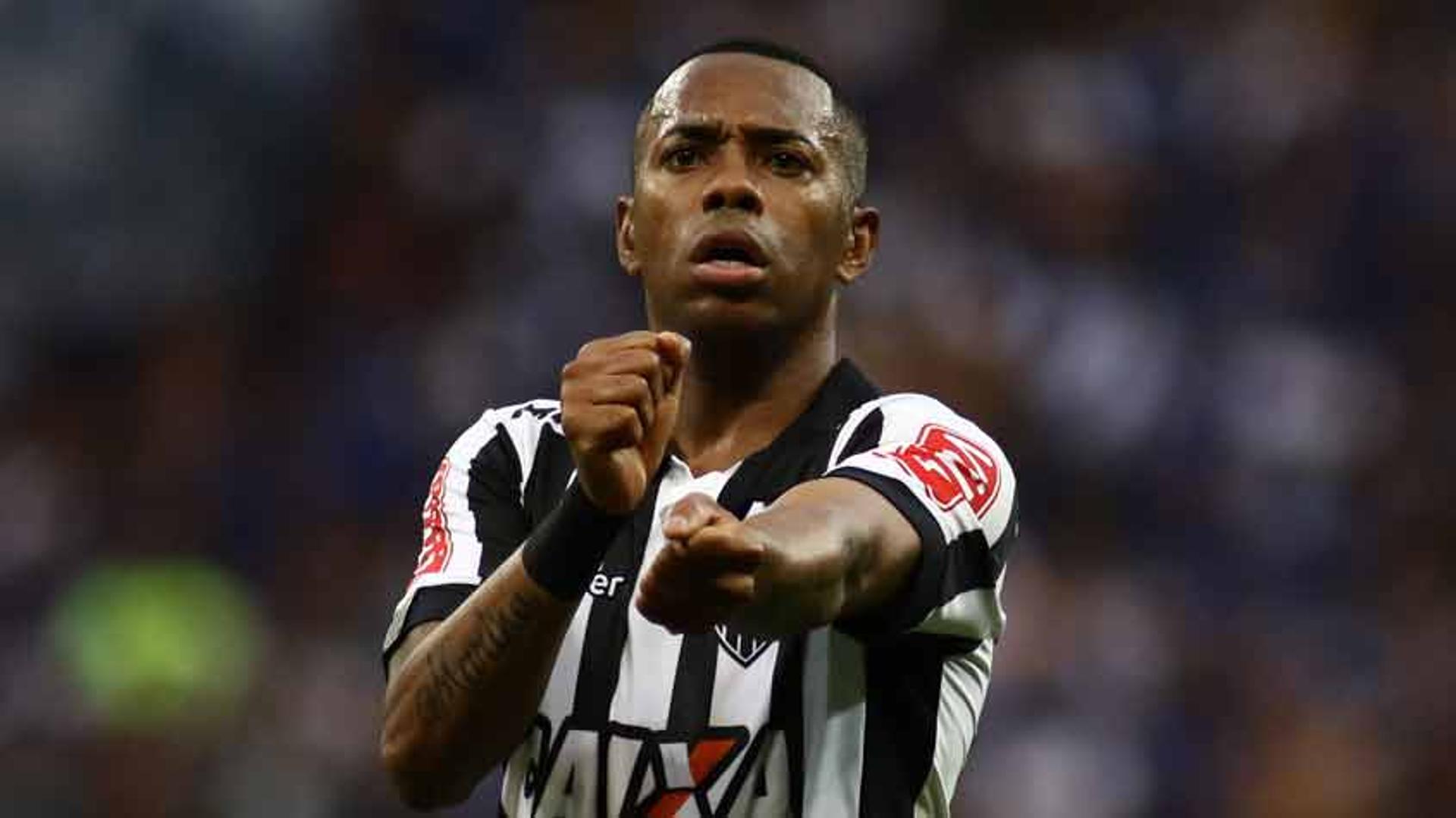 Robinho deu show e garantiu a boa vitória do Atlético-MG diante do Cruzeiro. Veja uma galeria de imagens do jogo