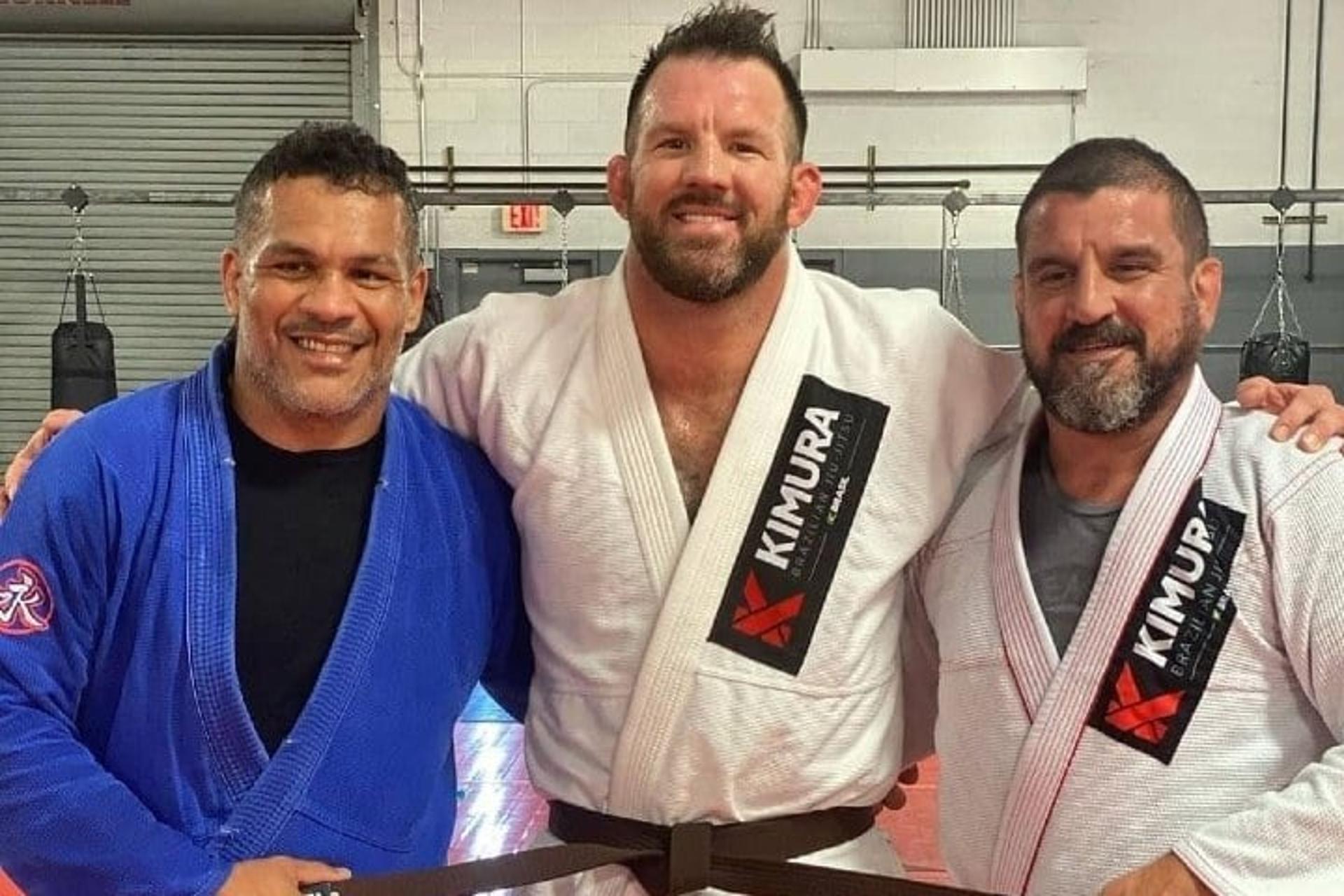 Luciano Gerson com o campeão do Bellator Ryan Bader e o líder da Kimura Jair Lourenço