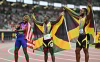 Medalhistas dos 100 metros (Foto: Andrej ISAKOVIC / AFP)