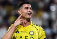 Cristiano Ronaldo comemorando o segundo gol marcado (Foto: Fayez Nureldine/AFP)