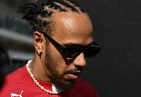 Ferrari's British driver Lewis Hamilton arrives for the practice session for the United States Formula One Grand Prix at the Circuit of the Americas in Austin, Texas, on October 17, 2025. (Photo by Jim WATSON / AFP)
