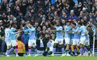 Jogadores do Manchester City comemoram gol do Wolves (Foto: Darren Staples / AFP)