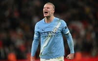 Haaland comemora gol da virada do City sobe o Liverpool (Foto: Paul ELLIS / AFP)