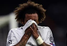Na vitória do Real Madrid por 1 a 0 sobre o PSG, Marcelo saiu de campo lesionado (AFP PHOTO / JAVIER SORIANO)