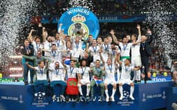 1280px-Real_Madrid_C.F._the_Winner_Of_The_Champions_League_in_2018_1-aspect-ratio-512-320