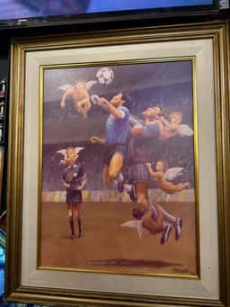 Miniatura da imagem: Gol de Maradona na Copa de 1986 é retratado em quadro (Foto: Lucas Bayer / Lance!)