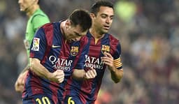 Barcelona x Sevilla - Campeonato Espanhol - Messi e Xavi (Foto: Lluis Gene/AFP)