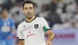 HOME - Xavi em ação pelo Al-Sadd do Qatar (Foto: AFP)