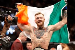 Conor McGregor é o novo campeão absoluto dos penas do UFC (FOTO: Getty Images)