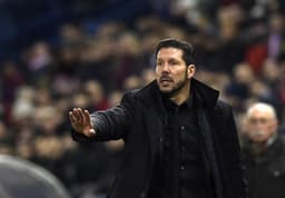 Simeone sabe que o Atlético precisa marcar mais gols para tentar ser campeão (Foto: Gerard Julien / AFP)