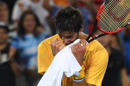 Thomaz Bellucci vibra após derrotar Pablo Cuevas no Rio