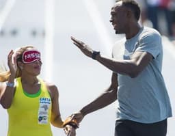 Bolt posta foto com Terezinha Guilhermina para saudar as Paralimpíadas