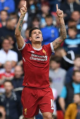 PHILIPPE COUTINHO: Especulado no Barcelona e no PSG, o meia deverá permanecer no Liverpool