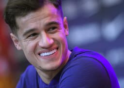 Imagens da apresentação de Coutinho no Barcelona