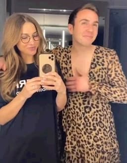 Götze e esposa