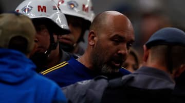 Torcedor do Boca Juniors sendo preso por ato racista na Arena do Corinthians