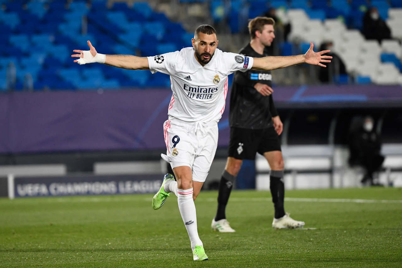 Benzema celebra gols na Champions e