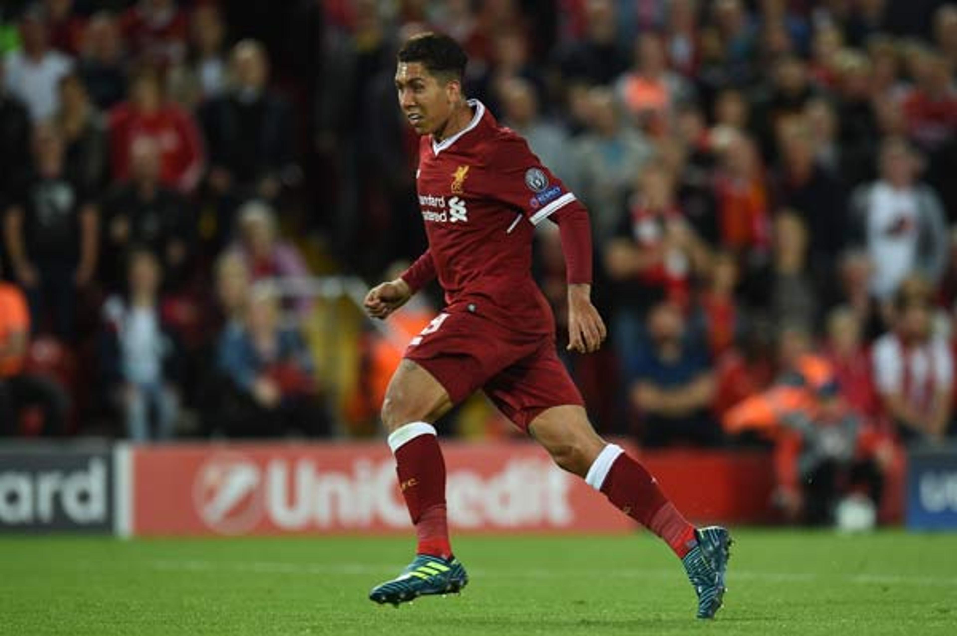 Com passe e gol, Firmino brilha em goleada do Liverpool na Champions