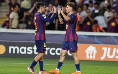 Com hat-trick de 'herói silencioso' Barcelona goleia Olympiacos por 6 a 1