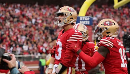 Quarterback calouro Brock Purdy estrrou como titular e teve ótimo jogo