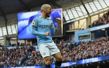 79698298_Manchester-Citys-Spanish-midfielder-David-Silva-celebrates-after-scoring-their-third-goal-aspect-ratio-512-320