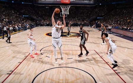 AFP__20250104__2191759576__v1__HighRes__SanAntonioSpursVDenverNuggets-scaled-aspect-ratio-512-320