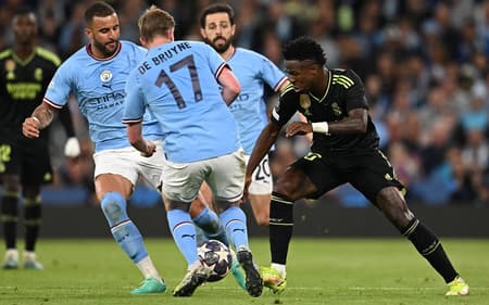 AFP__20230517__33FF2KU__v1__HighRes__FblEurC1ManCityRealMadrid-scaled-aspect-ratio-512-320