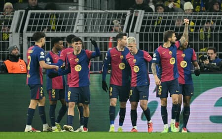 AFP__20241211__36Q88T9__v1__HighRes__FblEurC1DortmundBarcelona-scaled-aspect-ratio-512-320