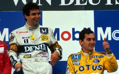 The podium (L to R): Stefan Johansson (SWE) McLaren second; Nelson Piquet (BRA) Williams winner; Ayrton Senna (BRA) Lotus third. German Grand Prix, Hockenheim, 26 July 1987.