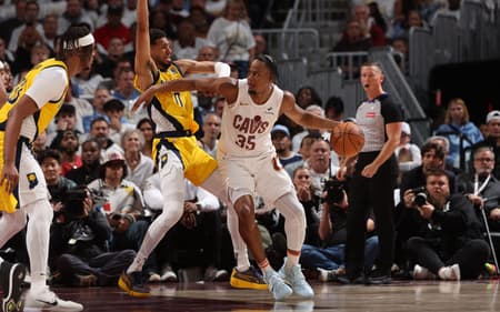 CLEVELAND, OH - MAY 6: Isaac Okoro #35 of the Cleveland Cavaliers dribbles the ball during the game against the Indiana Pacers during Round 2 Game 2 of the 2025 NBA Playoffs on May 6, 2025 at Rocket Arena in Cleveland, Ohio. NOTE TO USER: User expressly acknowledges and agrees that, by downloading and/or using this Photograph, user is consenting to the terms and conditions of the Getty Images License Agreement. Mandatory Copyright Notice: Copyright 2025 NBAE Joe Murphy/NBAE via Getty Images/AFP (Photo by JOE MURPHY / NBAE / Getty Images / Getty Images via AFP)