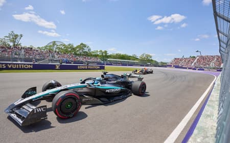 Mercedes' British driver George Russell races during the first practice session for the 2025 Formula 1 Grand Prix du Canada at Circuit Gilles-Villeneuve in Montreal, Canada, on June 13, 2025. (Photo by Geoff Robins / AFP)