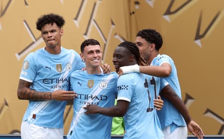 Manchester City comemora gol marcado contra o Wydad Casablanca pelo Mundial (Foto: Charly TRIBALLEAU / AFP)