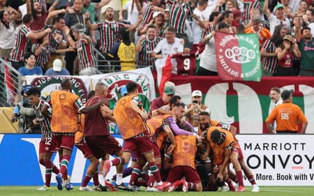 Fluminense comemora gol sobre o Ulsan (Foto: CHARLY TRIBALLEAU / AFP)