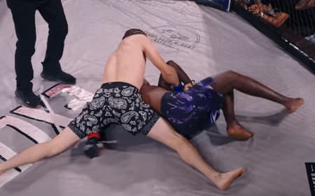 Momento em que Alain Mbonerane teve o braço quebrado (Foto: Reprodução)
