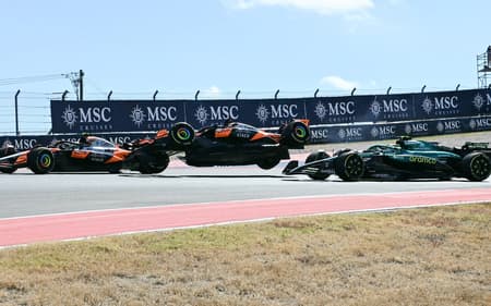 Batida entre Piastri e Norris no GP dos EUA de F1 (Foto: Jim Watson / AFP)