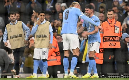Pela Champions League, o Manchester City venceu o Borussia Dortmund por 4 a 1 (Foto: Oli SCARFF / AFP)