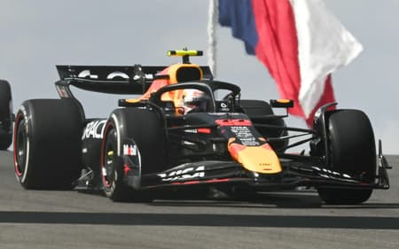 Red Bull Racing's Japanese driver Yuki Tsunoda (R) and Alpine's French driver Pierre Gasly (L) race during the practice session for the United States Formula One Grand Prix at the Circuit of the Americas in Austin, Texas, on October 17, 2025. (Photo by RONALDO SCHEMIDT / AFP)
