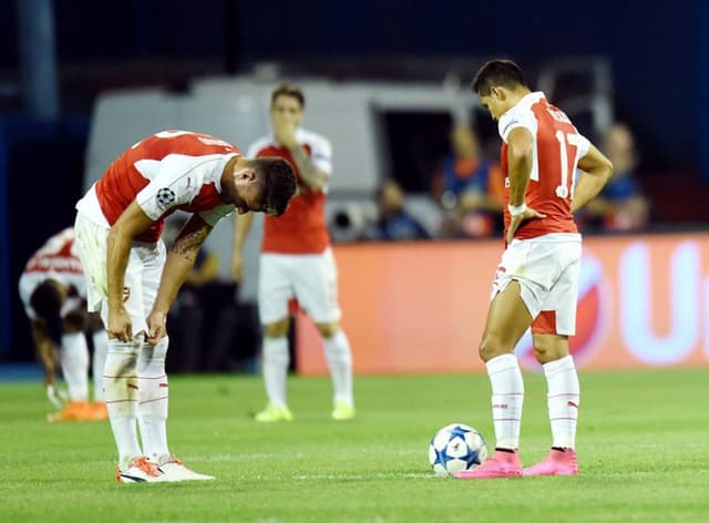 O Arsenal é o lanterna do grupo F, mas se recuperou na última rodada ao bater o forte Bayern de Munique por 2 a 0 e segue vivo (AFP PHOTO / STRINGER)