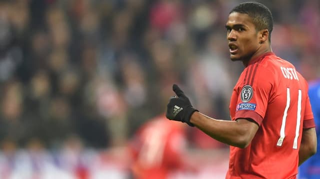 HOME - Bayern de Munique x Olympiacos - Liga dos Campeões - Douglas Costa (Foto: Christof Stache/AFP)