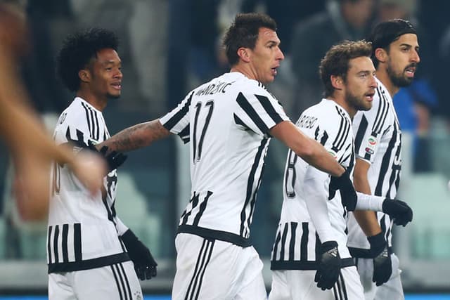 Cuadrado comemora o primeiro gol da Juventus (Foto: Marco Bertorello / AFP)