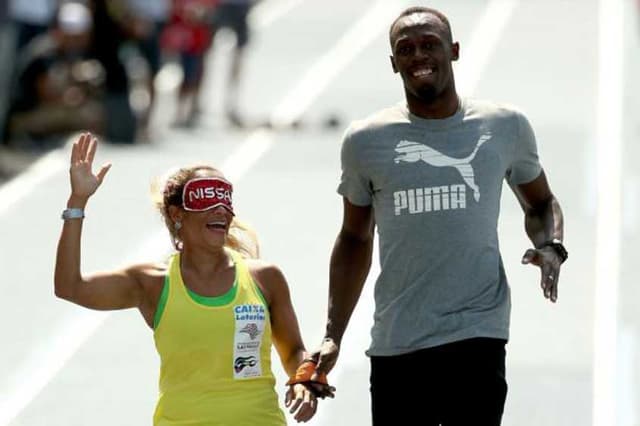 A fundista paralímpica brasileira Terezinha Guilhermina já correu tendo Bolt como seu guia