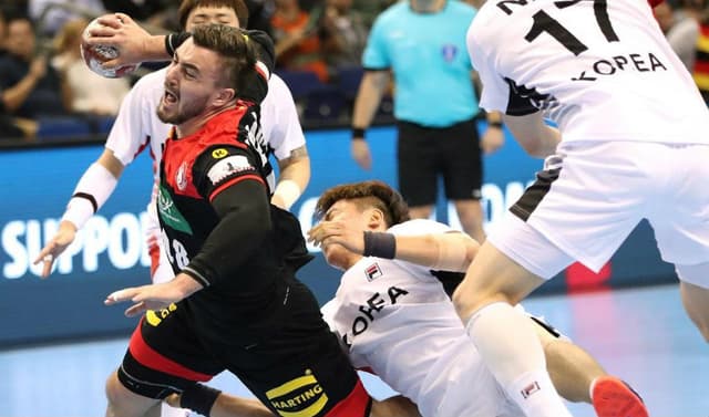 Lance entre Alemanha e Coreia, partida de abertura do Mundial masculino de handebol (Crédito:IHF)