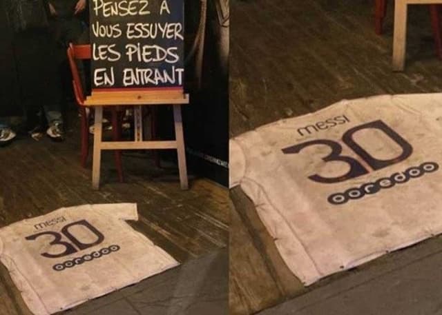 Camisa de Messi no chão de bar na França