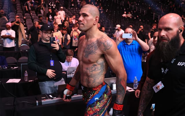 AFP__20250309__2204071339__v2__HighRes__Ufc313PereiraVAnkalaev-scaled-aspect-ratio-512-320