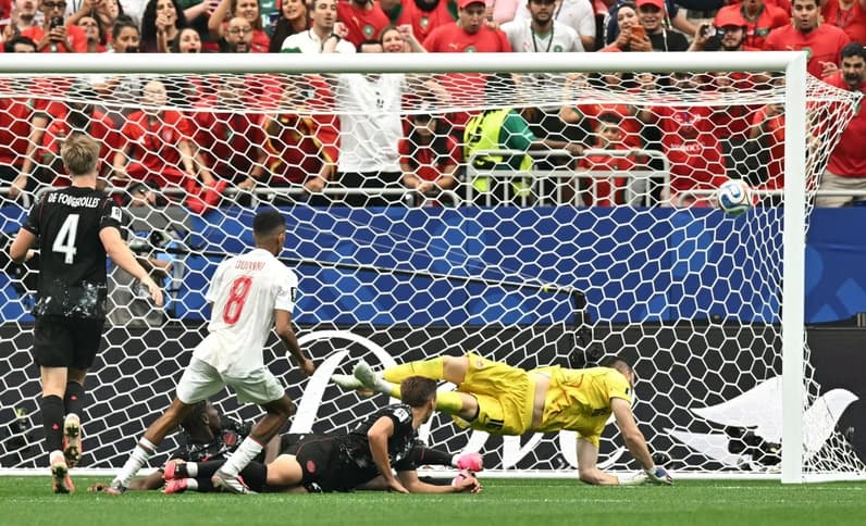 gol de Marrocos (Photo by Paul ELLIS / AFP)