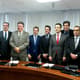 Nova composição do Pleno do STJD. O presidente aparece na foto com gravata vermelha (Foto: Igor Siqueira)